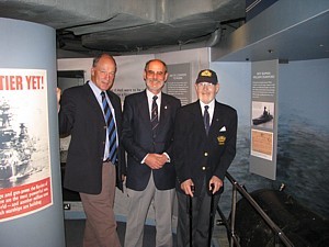 David Ouvry, Rob Hoole and Noel Cashford with John Ouvry's mine on board HMS Belfast