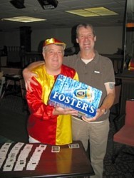 Steve 'Nemo' Wesby receives a crate from Les for winning Quarterdeck
