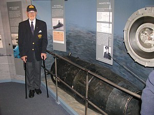 Wartime Bomb & Mine Disposal Officer and author Lt Noel Cashford MBE RNVR with Ouvry's mine on board HMS Belfast