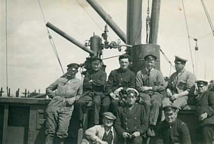 RN salvage team in 1919 with Rodney's grandfather wearing a white cap cover