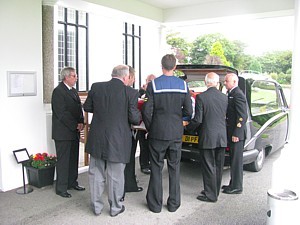 Pall bearers at Dave Ellis's funeral including his son Steve and SDU1 members
