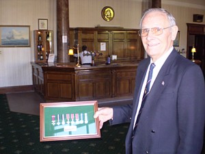 Brian Dutton with representative medals awarded to members of the MCD and CD Branches