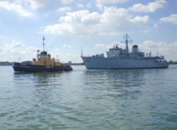 HMS Brocklesby under tow