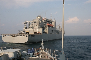 HMS Ramsey approaches USNS Lewis and Clark for RAS