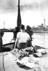 Diving tender in Haifa 1947 - HMS Chevron in background