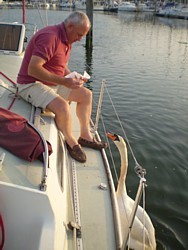 Holloway makes friends with a passing swan