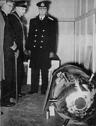 King George VI with Capt Riley (SMD), Lt Cdr Ouvry and his mine at HMS Vernon 19 Dec 1939