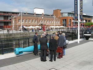 Gunwharf Quays Operations Manager Sean Sweeney MBE briefs sculpto