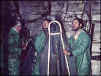 Tony Groom (centre) helping to remove a damaged Seacat missile from HMS Argonaut 